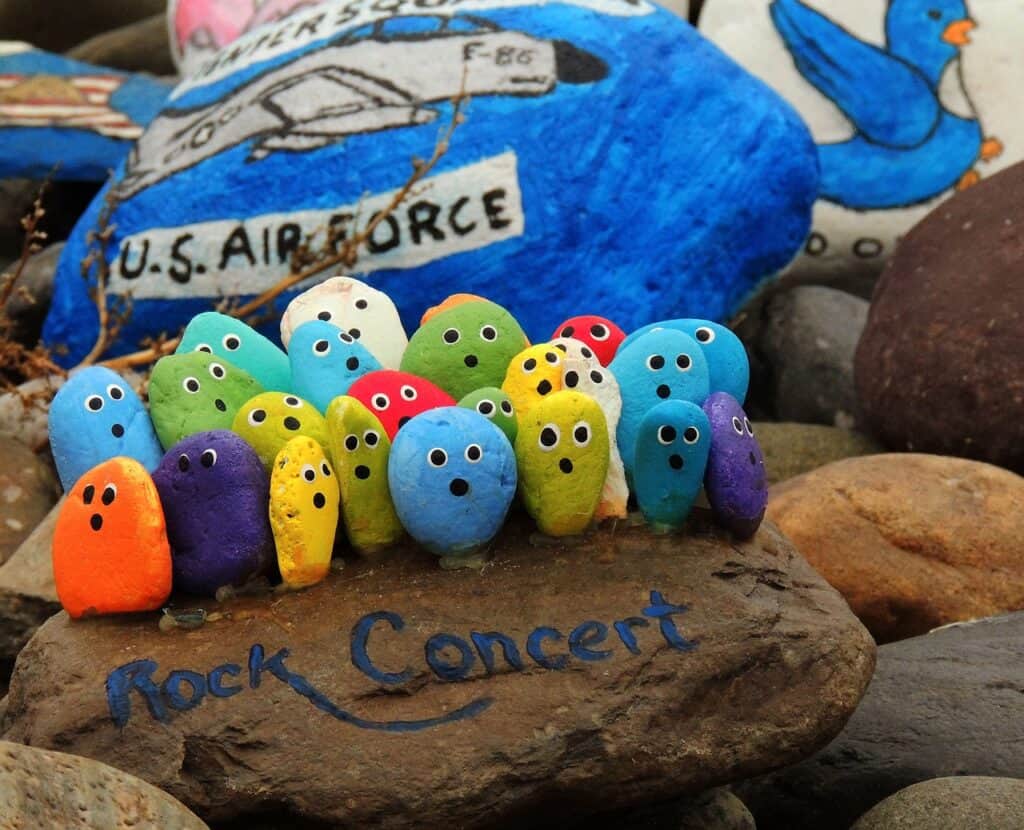 Easy beginner crafts for adults image.-Painted rocks-rock concert-rocks with eyes and mouth in a line